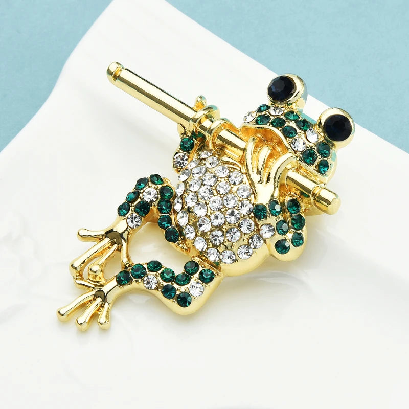 Wuli&baby Play Bamboo Fluting Frog Brooches Women Men Rhinestone Lovely Animal Party Casual Brooch Pins Gifts