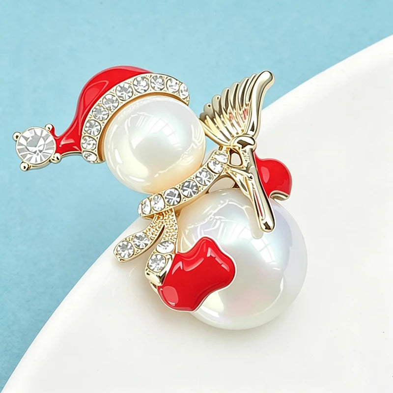 Wuli&baby Lovely Snowman Brooches Pins For Women Unisex Pearl Enamel Winter Snowman Christmas Brooch Pin New Year Gifts
